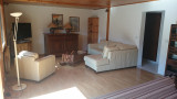 Séjour avec canapé et télévision/Living room with a sofa and a television-Chalet Ogegor-Le Grand-Bornand