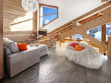 Séjour avec canapés et télévision/Living room with sofas and a television-Chalet Altaï-Le Grand-Bornand