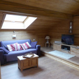 Séjour avec canapé et télévision/Living room with a sofa and a television-Clé des champs (Les Gentianes)-Le Grand-Bornand